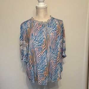 Vibrant Zebra Print Blouse with Blue and Pink Accents
